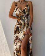 Robe longue élégante à motifs marbrés, fente haute, bretelles fines, style chic et moderne, idéale pour soirées et événements spéciaux.