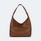 Sac à main en cuir marron, design moderne et minimaliste, avec une large anse. Accessoire de mode élégant pour femme, idéal pour un usage quotidien.
