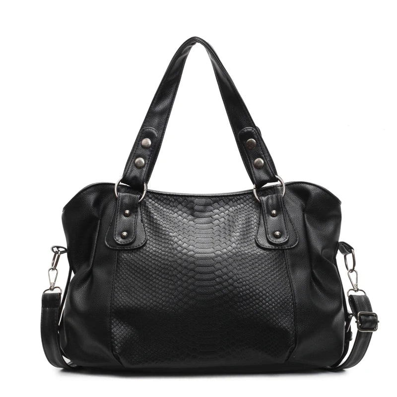 Sac à main noir en cuir texturé, design élégant avec poignées renforcées et bandoulière amovible. Accessoire mode femme chic et tendance.