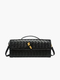 Sac à main noir en cuir tressé avec bandoulière, poignée supérieure et détails dorés. Élégant et moderne, parfait pour la mode féminine.