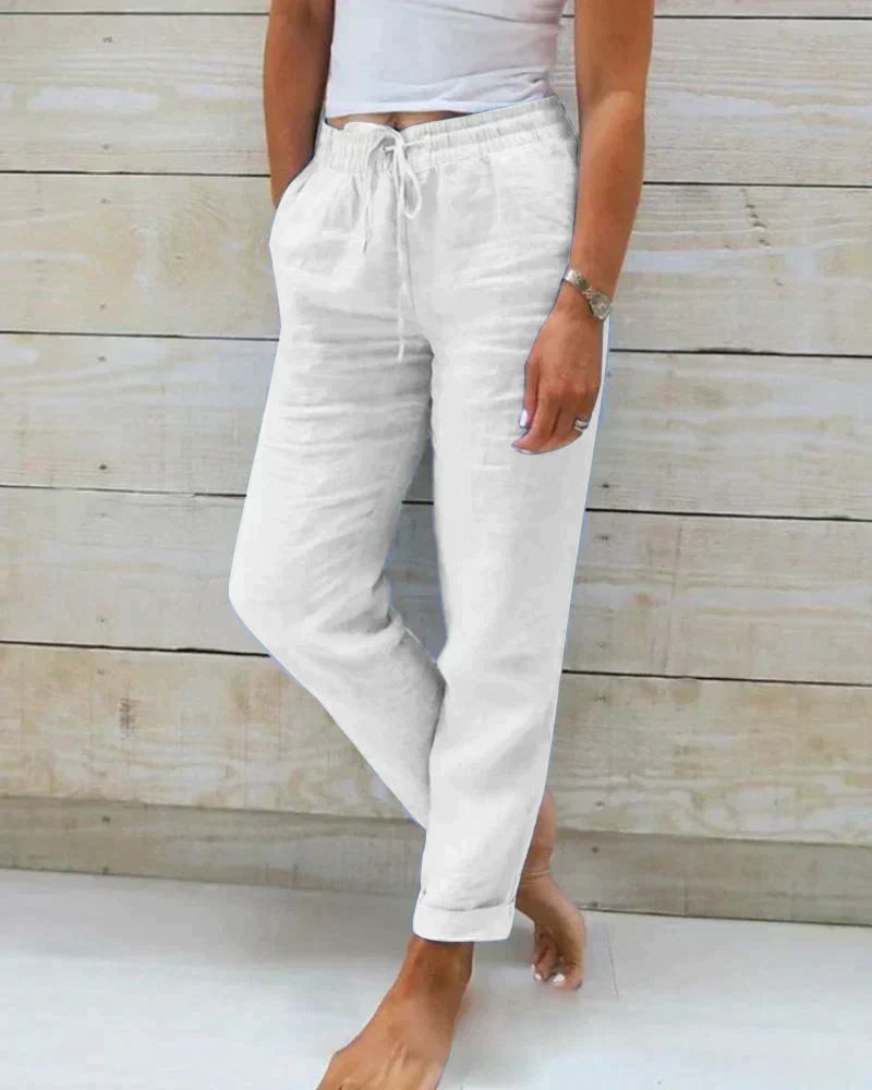 Pantalon blanc en lin pour femme, taille élastique avec cordon, poches latérales, style décontracté, idéal pour l'été et les tenues décontractées.