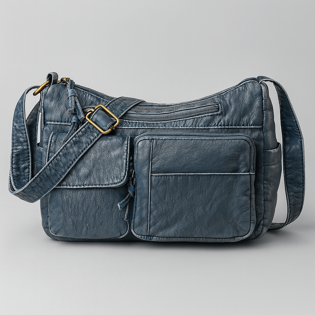 Sac à bandoulière en cuir bleu avec poches multiples et boucles dorées, design élégant et pratique pour femmes, accessoire mode tendance.