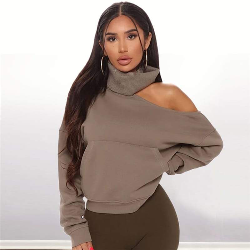 Long-sleeved turtleneck sweater with one exposed shoulder