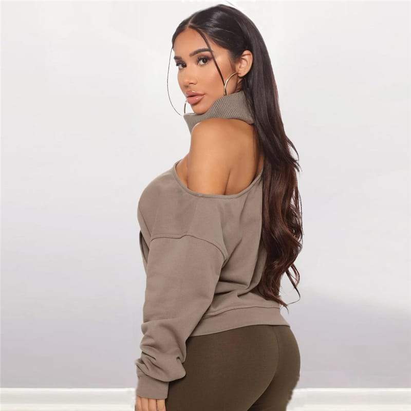 Long-sleeved turtleneck sweater with one exposed shoulder