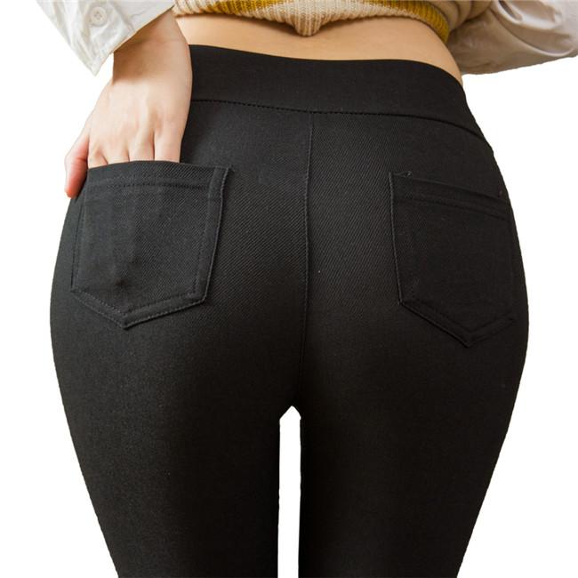 Pantalon moulant taille haute poche arrière