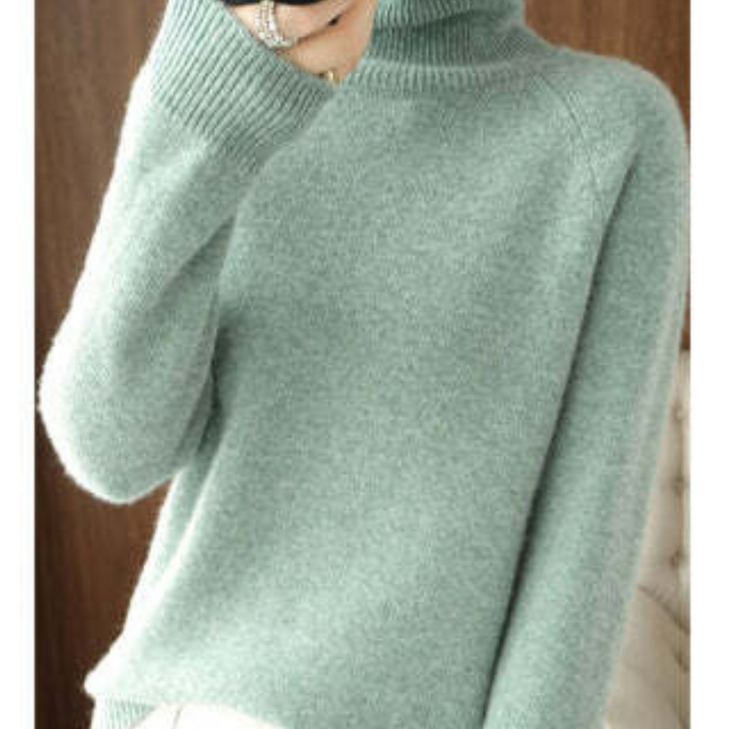 Pull en cachemire vert menthe, col roulé, manches longues, texture douce et élégante, mode automne-hiver, vêtement chaud et confortable.