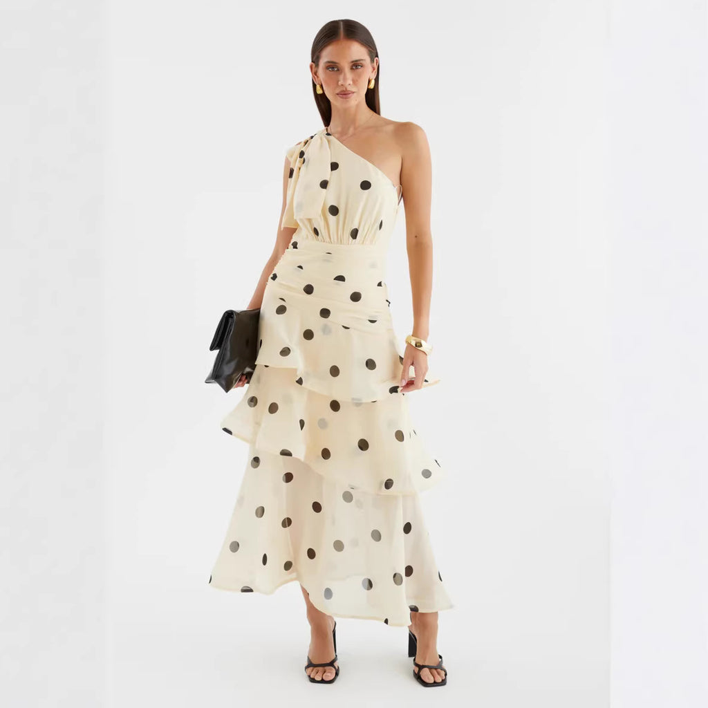 Asymmetrical polka dot dress with openwork details