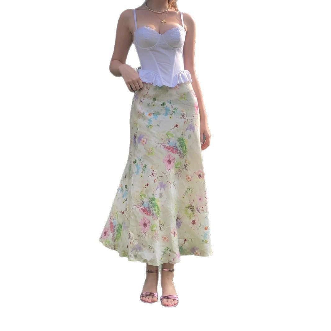 Jupe longue queue-de-poisson à taille amincie, motif floral