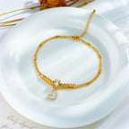 Chaîne double de cheville pendentif cœur