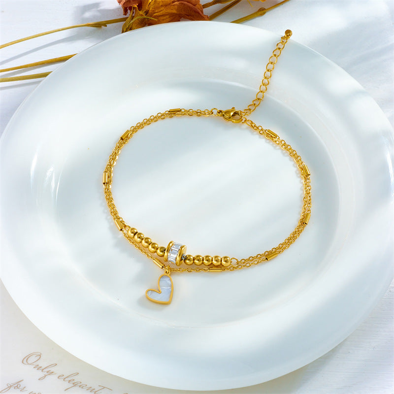 Chaîne double de cheville pendentif cœur