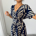 Long dress with short sleeves and fitted waist