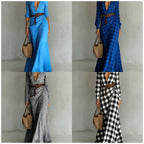 Asymmetrical pleated dress with matching belt