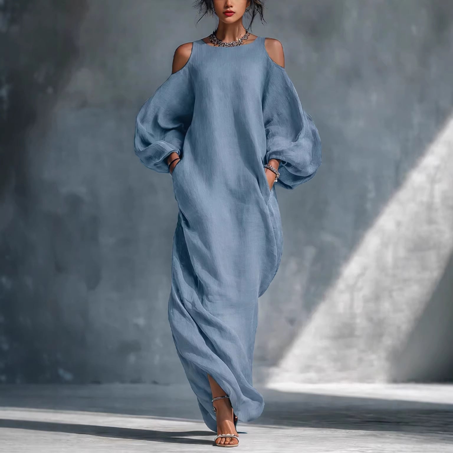 Robe midi épaules dénudées, manches longues et ourlet asymétrique