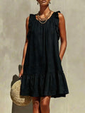 Robe droite sans manches, col rond et volants