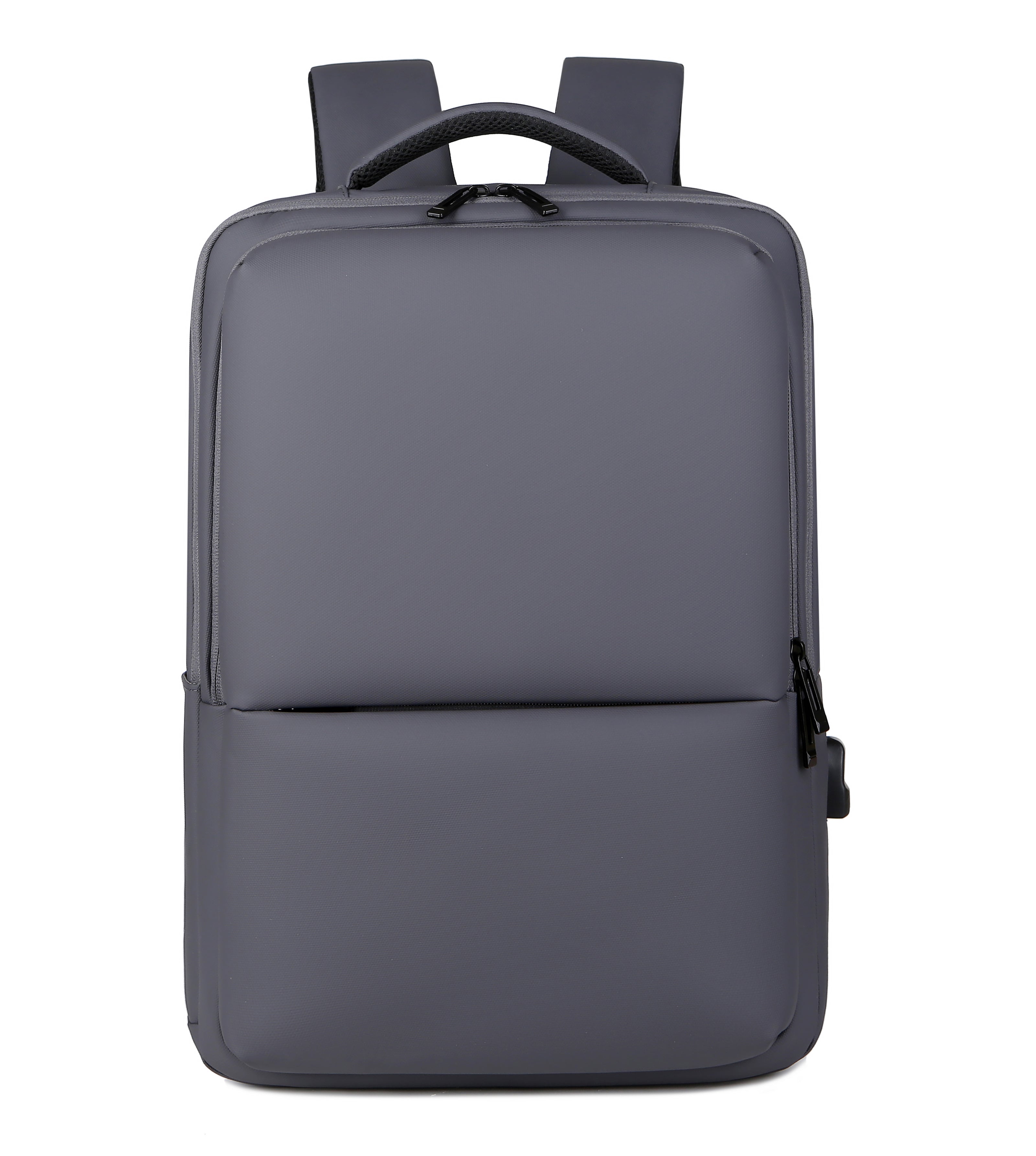 Sac à dos gris moderne et minimaliste, avec bretelles rembourrées, poche avant zippée, idéal pour ordinateur portable et usage quotidien.