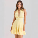 Mini robe jaune dos nu encolure plongeante