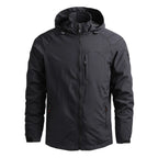 Veste noire imperméable à capuche, fermeture éclair, poches zippées, idéale pour activités extérieures, randonnée, style moderne et fonctionnel.