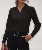 Women's tailored blouse with button placket, ideal for office wear.