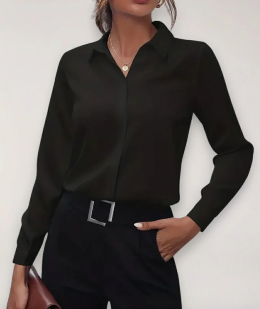 Women's tailored blouse with button placket, ideal for office wear.