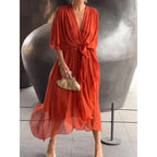Robe asymétrique manches chauve-souris — Élégance fluide