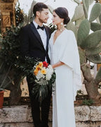 Wedding outfit with a cape