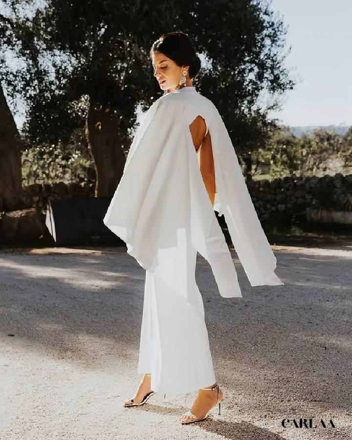 Wedding outfit with a cape