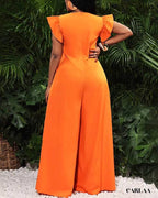 Flowing orange jumpsuit