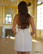 Robe avec perle blanche