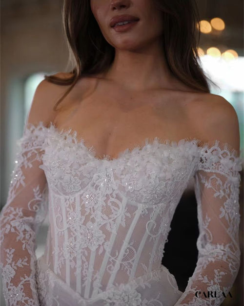 Robe mariée dentelle manche longue