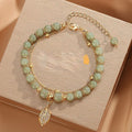 Bracelet perles chinoises et pendentif en forme de feuille - Chic&Shines