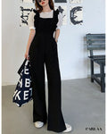 combi-femme-noire-salopette
