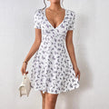 Robe blanche à pois élégante