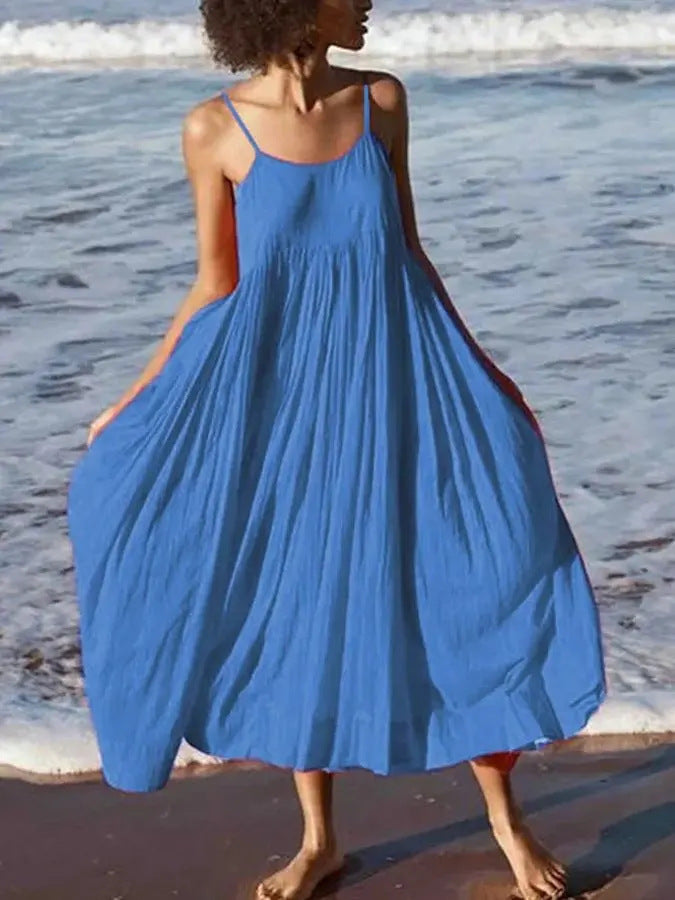 Sleeveless fluid midi wrap dress