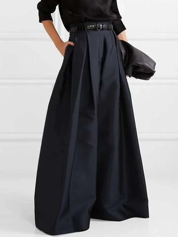 Jupe longue noire élégante avec plis, ceinture assortie, tenue chic pour femme, mode contemporaine, style sophistiqué, vêtement de soirée.