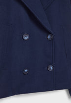 Manteau court pour femme avec double rangée de boutons et design intemporel