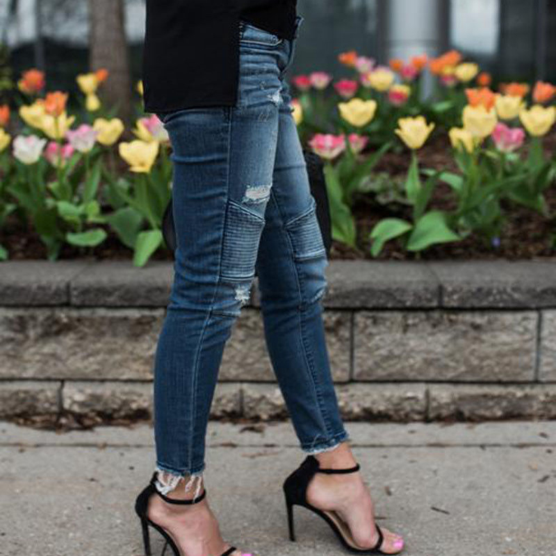 Jeans skinny déchirées à plis