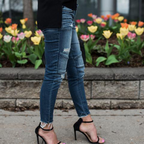 Jeans skinny déchirées à plis