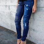 Jeans skinny déchirées à plis