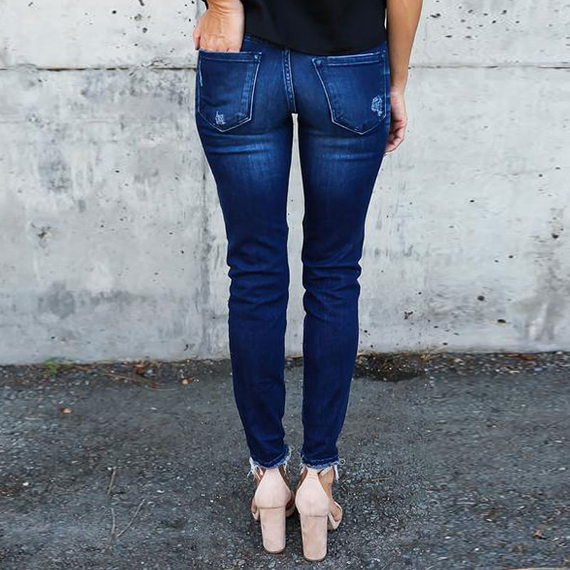 Jeans skinny déchirées à plis