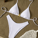 Sofia — White two-piece bikini with ties and metallic finishes