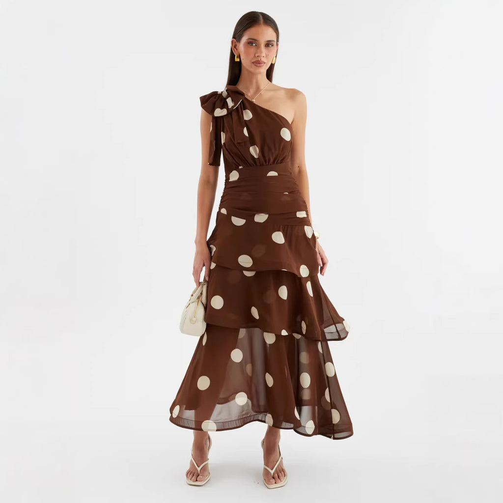 Asymmetrical polka dot dress with openwork details