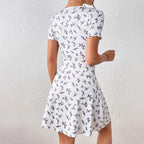 Robe blanche à pois élégante