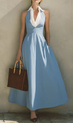 Robe longue bleu ciel, encolure drapée et taille cintrée
