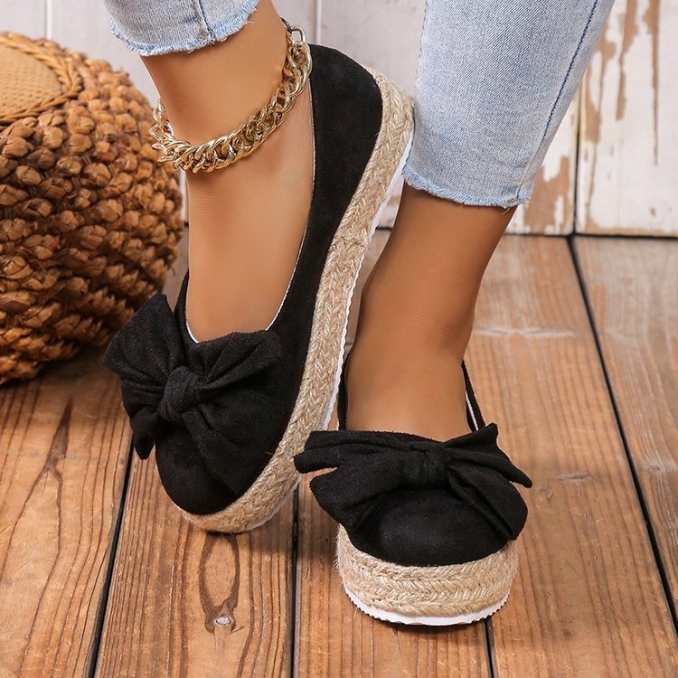 Platform shoes with bow
