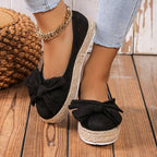 Platform shoes with bow