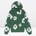 Sweat à capuche vert avec motifs floraux blancs, poche kangourou. Mode tendance, vêtement décontracté, style urbain.