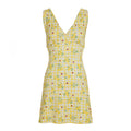 Jupe patineuse jaune dos nu, taille resserrée