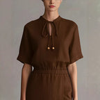 Robe midi nœud au col – Élégance intemporelle