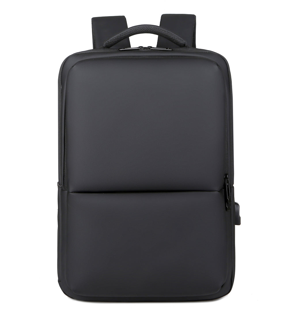 Sac à dos noir minimaliste, design moderne, compartiment pour ordinateur portable, idéal pour le travail et les voyages. Accessoire tendance et fonctionnel.