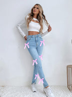 Jean slim stretch avec détail nœud